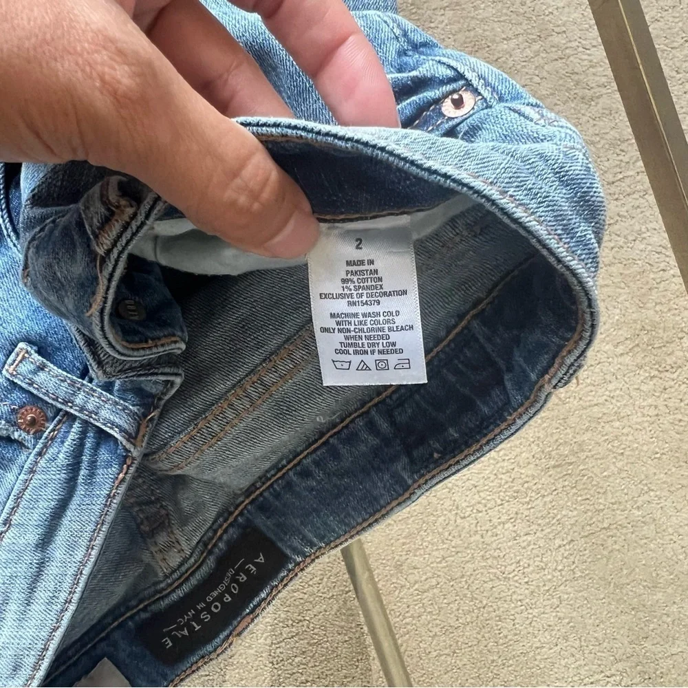 Distressed denim shorts.